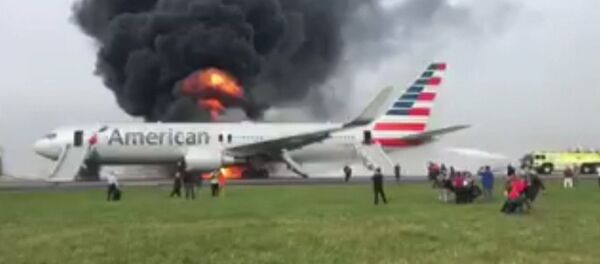 Incendio en un avión provoca caos y pánico en Chicago - Sputnik Mundo