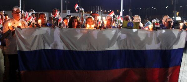 Homenaje a las víctimas del siniestro de A321 ruso en Egipto - Sputnik Mundo