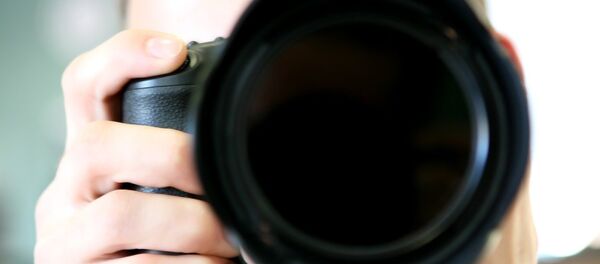 Un periodista Un periodista - Sputnik Mundo