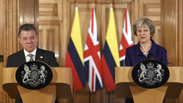 Juan Manuel Santos, el presidente de Colombia y Theresa May, la primera ministra del Reino Unido - Sputnik Mundo