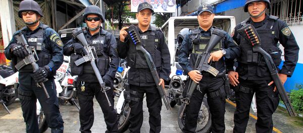 Miembros del equipo SWAT de la Policía Nacional de Filipinas - Sputnik Mundo
