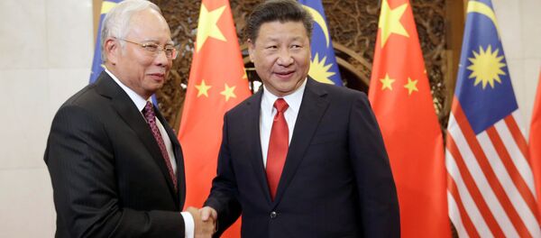 El primer ministro de Malasia, Najib Razak, y el presidente de China, Xi Jinping - Sputnik Mundo