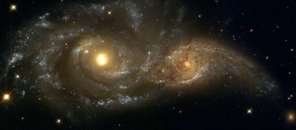 La fusión de las galaxias IC 2163 y NGC 2207 - Sputnik Mundo