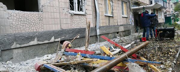 Consecuencias de bombardeo en Makéevka, Donbás - Sputnik Mundo