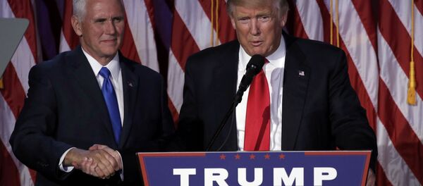 Donald Trump, el ganador de las elecciones presidenciales en EEUU y Mike Pence, su vicepresidente - Sputnik Mundo
