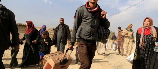 Los civiles en Mosul, Irak - Sputnik Mundo