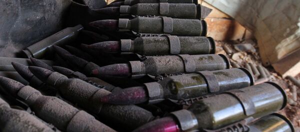 Abandoned magazine of shells is pictured after rebel fighters took control of Dahiyet al-Assad, west Aleppo city - Sputnik Mundo