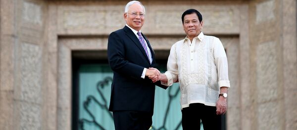 Najib Razak, primer ministro de Malasia y Rodrigo Duterte, presidente de Filipinas, - Sputnik Mundo