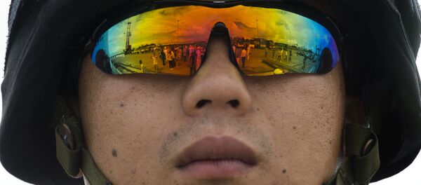 Un soldado chino - Sputnik Mundo