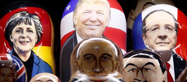 Muñecas pintadas de Matryoshka con caras de líderes mundiales - Sputnik Mundo