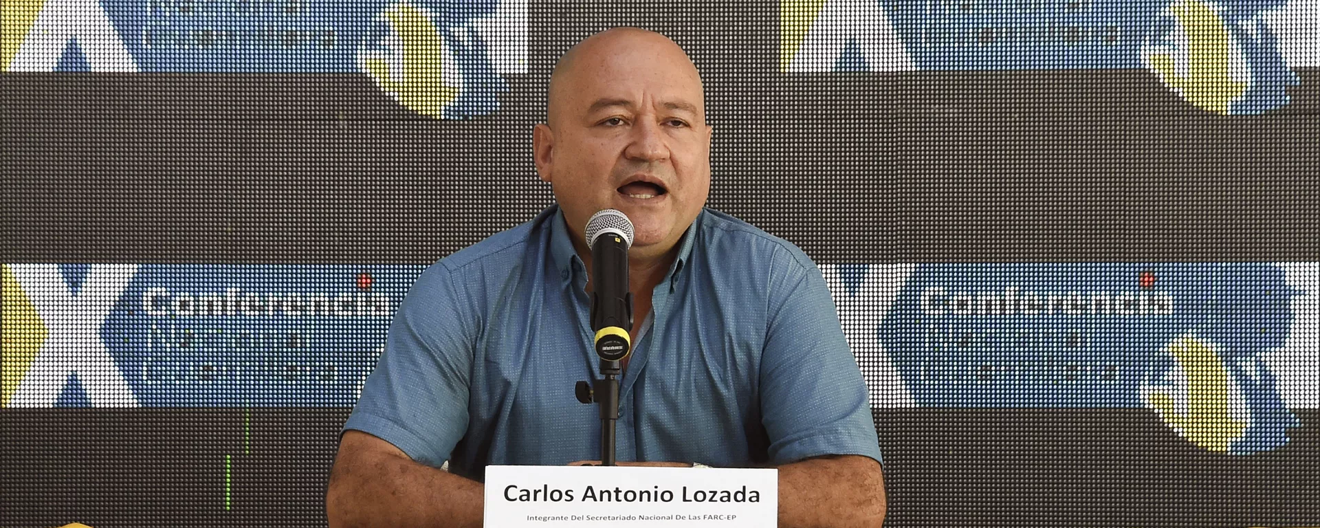 Commander Carlos Antonio Lozada, member of the direction of the Revolutionary Armed Forces of Colombia (FARC), speaks during the 10th National Guerrilla Conference in Llanos del Yari, Caqueta department, Colombia, on September Commander Carlos Antonio Lozada, member of the direction of the Revolutionary Armed Forces of Colombia (FARC), speaks during the 10th National Guerrilla Conference in Llanos del Yari, Caqueta department, Colombia, on September - Sputnik Mundo, 1920, 19.04.2021