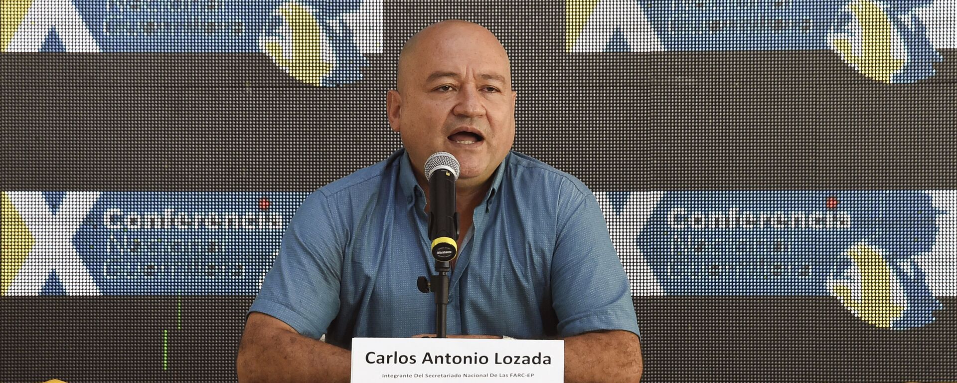Commander Carlos Antonio Lozada, member of the direction of the Revolutionary Armed Forces of Colombia (FARC), speaks during the 10th National Guerrilla Conference in Llanos del Yari, Caqueta department, Colombia, on September - Sputnik Mundo, 1920, 19.04.2021