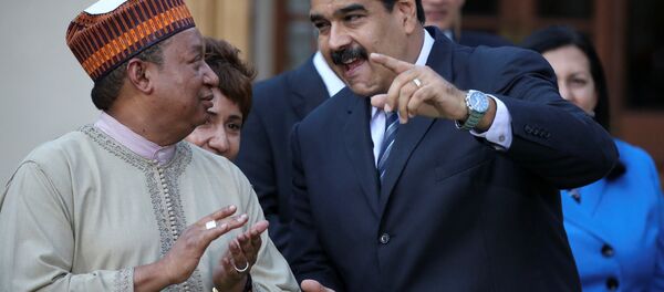 El secretario general del OPEP, Mohammed Barkindo y el presidente de Venezuela, Nicolás Maduro (archivo) - Sputnik Mundo