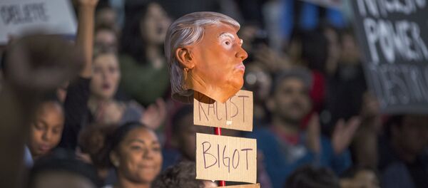 Protestas contra el recien elegido nuevo presidente de los EEUU, Donald Trump - Sputnik Mundo