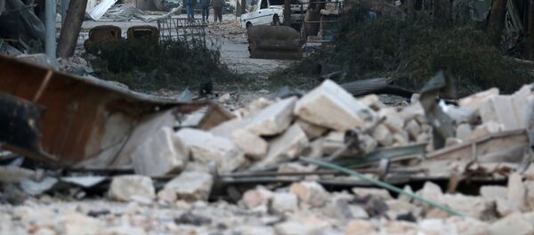 Una zona destruida por la guerra, en Alepo (Siria) - Sputnik Mundo