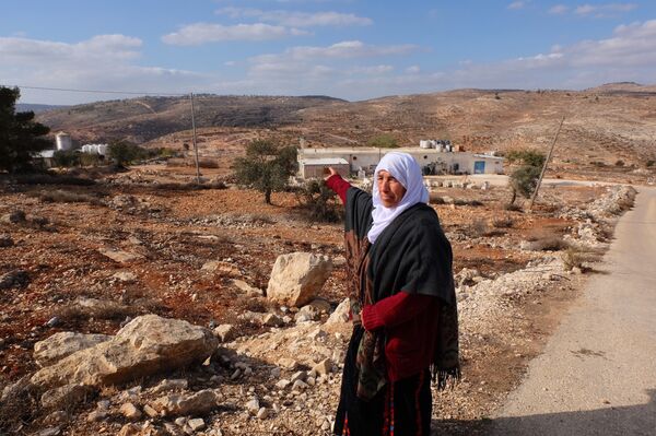 Una señoras palestinas que reclama sus tierras en Amona - Sputnik Mundo