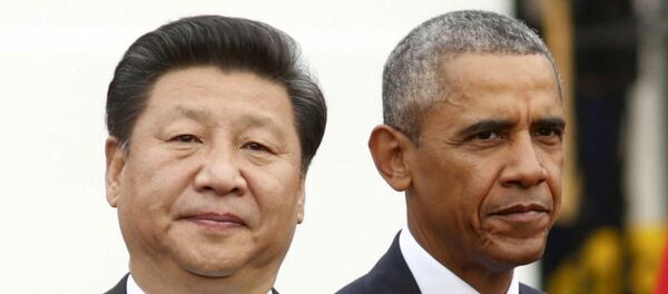 El presidente de Estados Unidos Barack Obama se encuentra con el presidente chino Xi Jinping - Sputnik Mundo