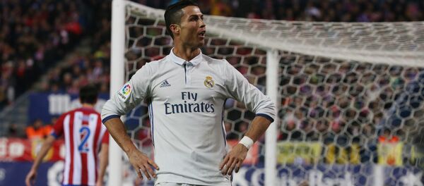 Cristiano Ronaldo comemora su gol, durante partido contra Atletico de Madrid - Sputnik Mundo