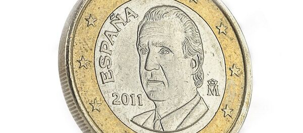 Una moneda de euro en España - Sputnik Mundo