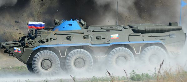 Un carro blindado del Ejército de Rusia Un carro blindado del Ejército de Rusia - Sputnik Mundo