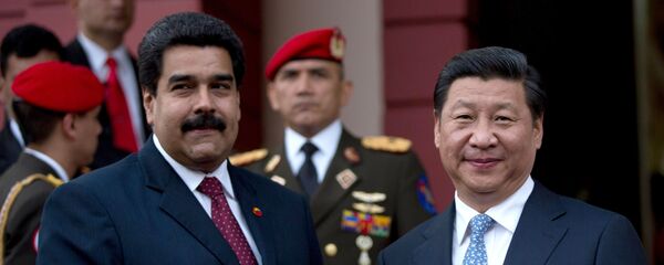 El presidente de Venezuela, Nicolás Maduro, y el presidente de China, Xi Jinping - Sputnik Mundo