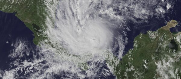 Una tormenta desde el espacio (imagen referencial) - Sputnik Mundo