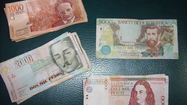 Pesos colombianos - Sputnik Mundo
