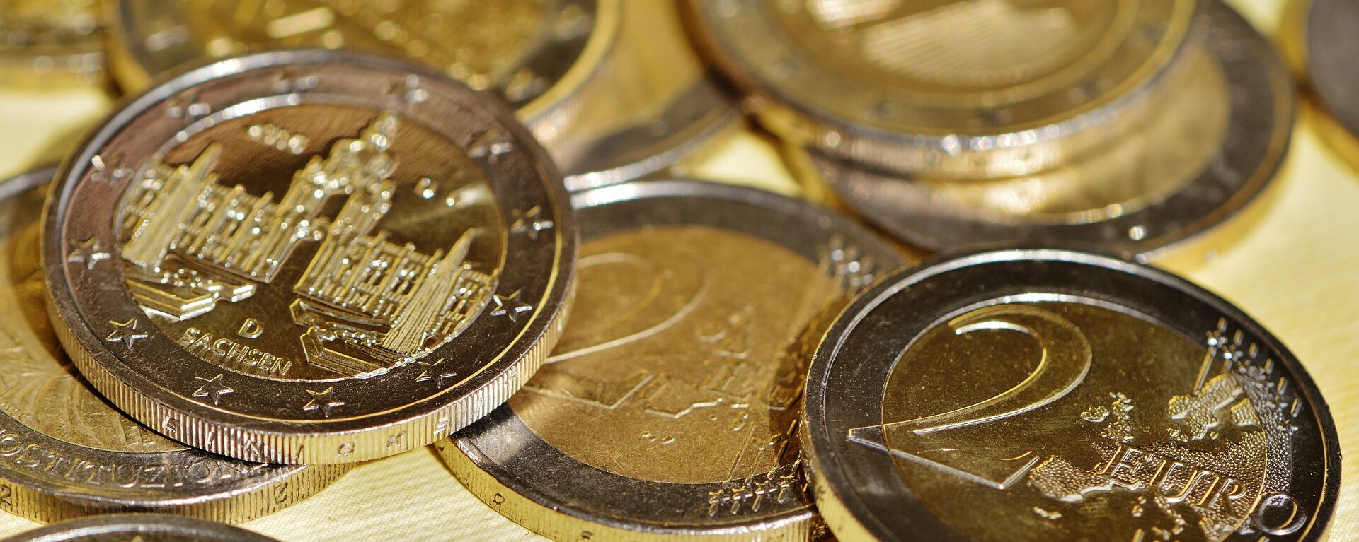 Monedas de dos euros (imagen referencial) Monedas de dos euros (imagen referencial) - Sputnik Mundo, 1920, 07.09.2021