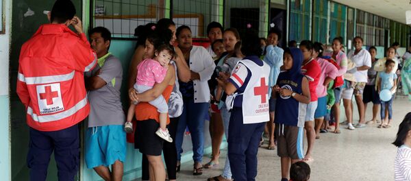 La gente evacuada por el acercamiento del huracán Otto en Costa Rica La gente evacuada por el acercamiento del huracán Otto en Costa Rica - Sputnik Mundo