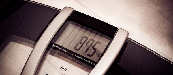 Una balanza - Sputnik Mundo