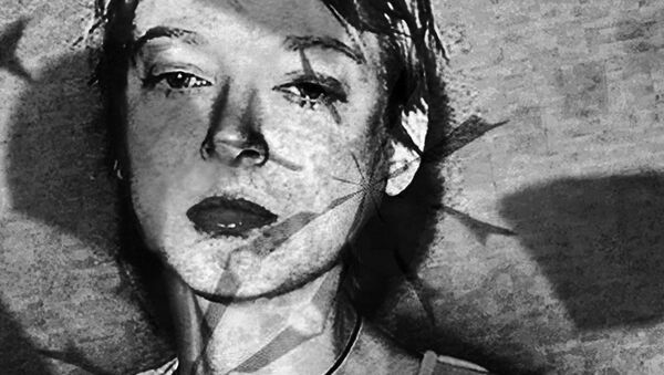 Una mujer - Sputnik Mundo