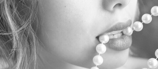 Labios de mujer - Sputnik Mundo