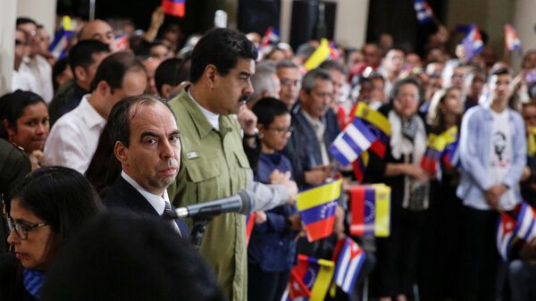 Rogelio Polanco y Nicolas Maduro - Sputnik Mundo