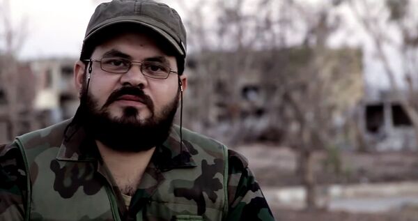 Kais Kadur, de 31 años, vendió su pequeño negocio en 2011 para unirse al Ejército sirio. - Sputnik Mundo