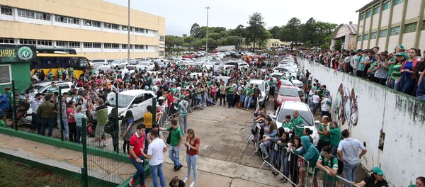 Fans of Chapecoense soccer team are pictured in front of the Arena Conda stadium in Chapeco, Brazil Fans of Chapecoense soccer team are pictured in front of the Arena Conda stadium in Chapeco, Brazil - Sputnik Mundo
