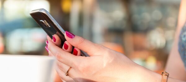 Un móvil (imagen referencial) - Sputnik Mundo