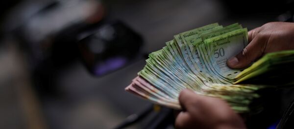 Bolívares (imagen referencial) - Sputnik Mundo