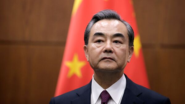 Wang Yi, ministro de Exteriores de China - Sputnik Mundo