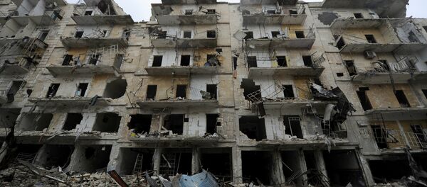 Edificios destruidos en Alepo - Sputnik Mundo