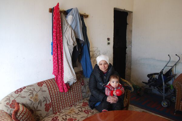 Bushara as-Said Taha, 35 años, residente del barrio de Sukkari, Alepo. - Sputnik Mundo