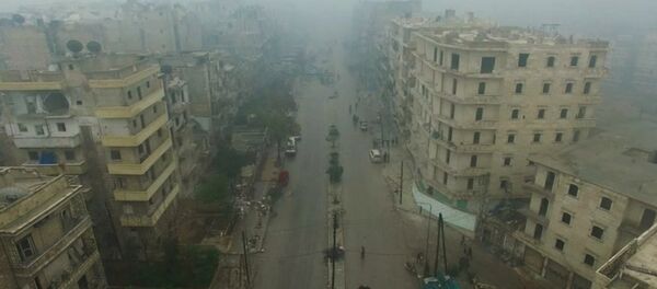 A still image from video taken December 13, 2016 of a general view of eastern Aleppo, Syria in the rain - Sputnik Mundo