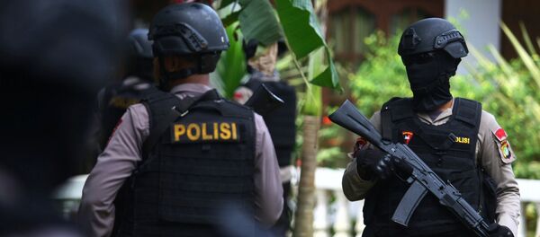Policías indonesios - Sputnik Mundo