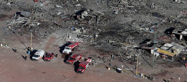 Consecuencias de la explosión e incendios en el mercado de pirotecnia de San Pablito en Tultepec, México - Sputnik Mundo