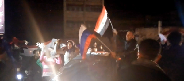 Gran victoria: ciudadanos celebran la liberación de Alepo - Sputnik Mundo