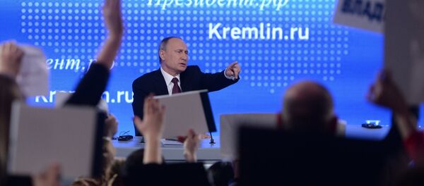 El presidente ruso Vladímir Putin responde a las preguntas durante la 12ª conferencia de prensa anual, 23 de diciembre de 2016 - Sputnik Mundo