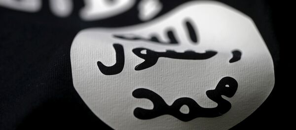 An Islamic State flag is seen in this picture illustration taken February 18, 2016. - Sputnik Mundo