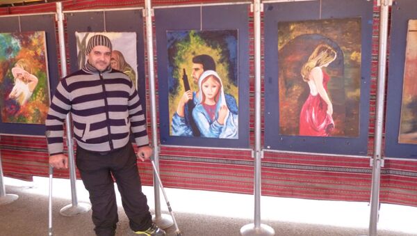 Shadi Suleiman, artista paralítico sirio Shadi Suleiman, artista paralítico sirio - Sputnik Mundo