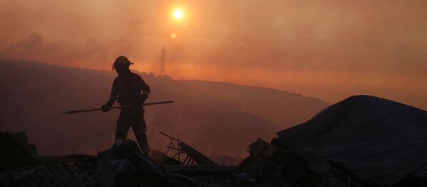 Un bombero chileno (imagen ilustrativa) - Sputnik Mundo
