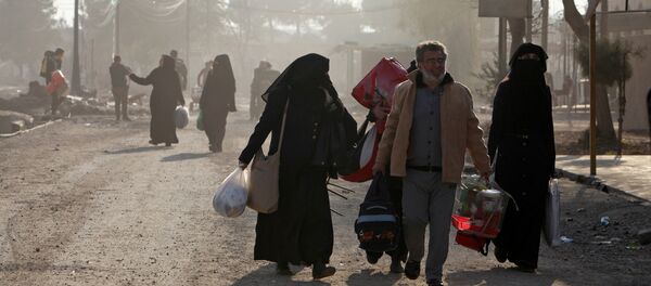 Los residentes de Mosul abandonan sus casas (archivo) - Sputnik Mundo