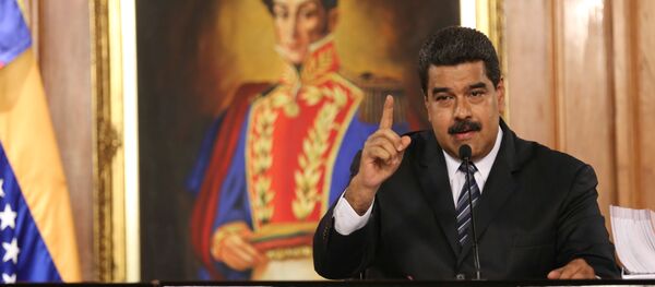 El presidente de Venezuela, Nicolás Maduro, habla durante una reunión con empresarios en Caracas - Sputnik Mundo